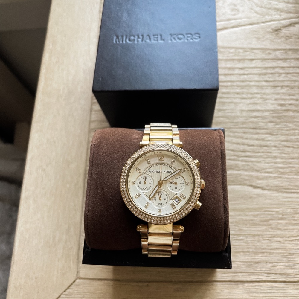 Women’s Michael Kors watch in original box.